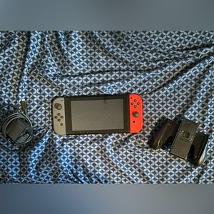 Nintendo switch with joycon controller and original charger